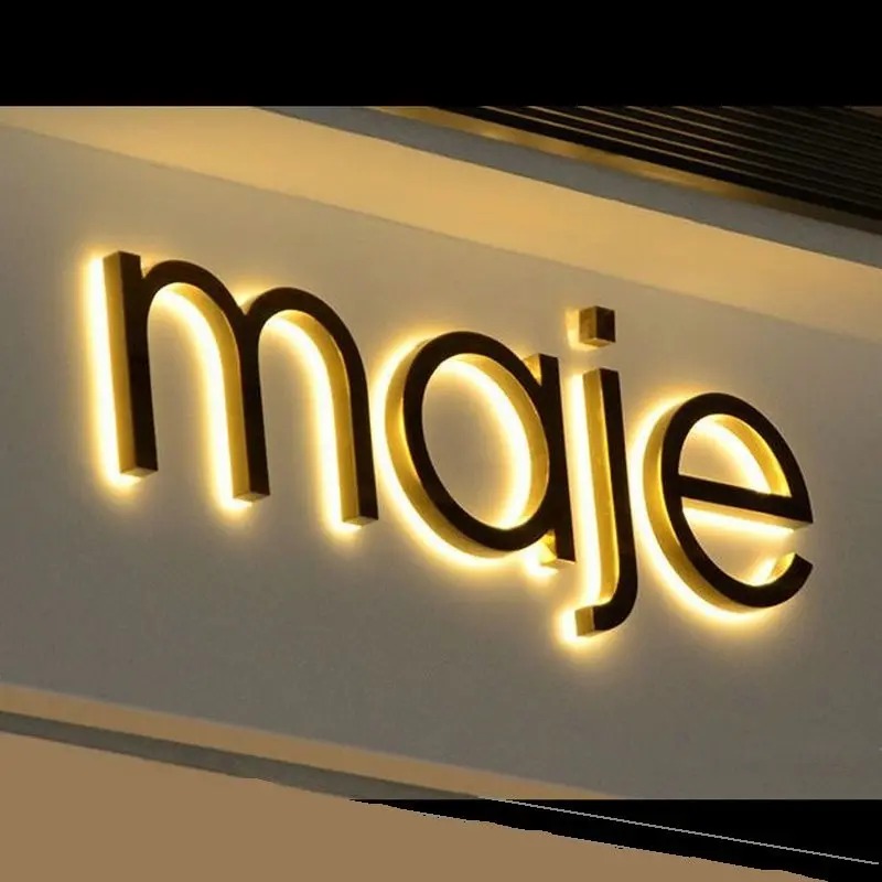 Letra caixa preta com retroiluminação LED quente para fachada da loja Maje